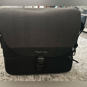 Black and Gray Nuna diaper bag comes with changing pad and bottle warmer!